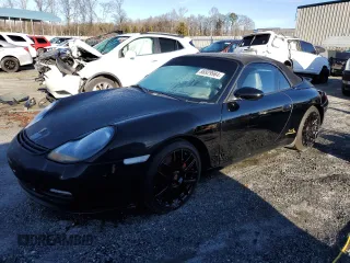 1999 Porsche 911 with VIN WP0CA2997XS656332, listed as a Copart auction lot 86929964 with Not Provided miles and Salvage Title. Bid and sale history available at DreamBid. Image 1.