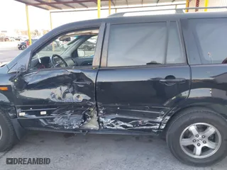 2006 Honda Pilot EX-L with RES with VIN 5FNYF28616B029670, listed as a IAAI auction lot 41425494 with 206,756 mi miles. Bid and sale history available at carsss.com. Image 14.