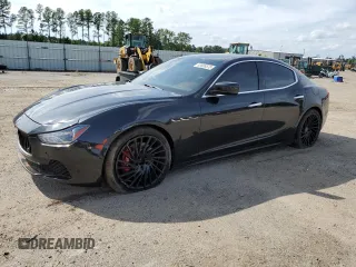 2015 Maserati Ghibli S Q4 with VIN ZAM57RTA1F1143547, listed as a Copart auction lot 63608573 with 84,917 mi miles. Bid and sale history available at carsss.com. Image 1.