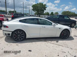 2017 Tesla Model S 100D with VIN 5YJSA1E45HF189006, listed as a IAAI auction lot 42540693 with 64,827 mi miles and . Bid and sale history available at DreamBid. Image 14.