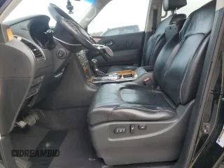 2012 Infiniti QX56 8-passenger with VIN JN8AZ2ND8C9715923, listed as a Copart auction lot 79192944 with 250,177 mi miles and Salvage Title. Bid and sale history available at carsss.com. Image 7.