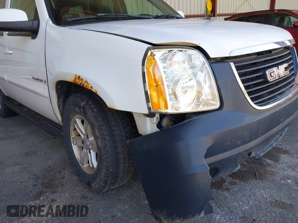 2007 GMC Yukon SLT z VIN 1GKFK13027J332987, wystawiony jako IAAI lot #42265048 z przebiegiem 206 293 mil mil oraz . Historia ofert i sprzedaży dostępna na DreamBid. Obrazek 6.