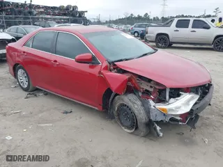 2012 Toyota Camry Hybrid XLE with VIN 4T1BD1FK0CU022472, listed as a IAAI auction lot 41536095 with 242,866 mi miles. Bid and sale history available at carsss.com. Image 1.