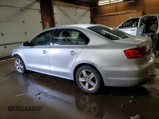 2014 Volkswagen Jetta TDI w/Premium with VIN 3VW3L7AJ3EM310892, listed as a Copart auction lot 61235765 with 242,970 mi miles and Salvage title. Bid and sale history available at DreamBid. Image 2.