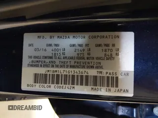 2016 Mazda 3 i Touring with VIN JM1BM1L71G1343674, listed as a IAAI auction lot 41630218 with 70,052 mi miles and . Bid and sale history available at DreamBid. Image 9.