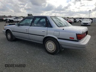 1989 Toyota Camry z VIN JT2VV22E3K0049538, wystawiony jako Copart lot #78870034 z przebiegiem 100 396 mil mil oraz Czysty tytuł • Clean title. Historia ofert i sprzedaży dostępna na DreamBid. Obrazek 2.
