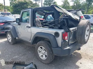 2014 Jeep Wrangler Sport with VIN 1C4AJWAG6EL192448, listed as a IAAI auction lot 42479738 with 44,848 mi miles and . Bid and sale history available at DreamBid. Image 3.