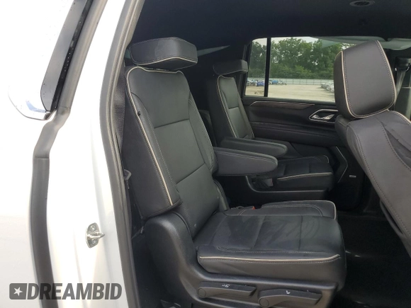 2023 Chevrolet Suburban Premier z VIN 1GNSCFKD0PR504435, wystawiony jako Copart lot #60309665 z przebiegiem 50 744 mil mil oraz Czysty tytuł • Clean title. Historia ofert i sprzedaży dostępna na DreamBid. Obrazek 11.