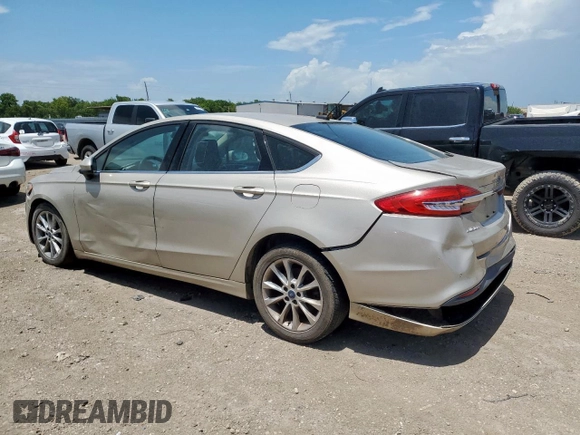 2017 Ford Fusion SE z VIN 3FA6P0HD7HR363913, wystawiony jako Copart lot #63848065 z przebiegiem 121 589 mil mil oraz Czysty tytuł • Clean title. Historia ofert i sprzedaży dostępna na DreamBid. Obrazek 2.
