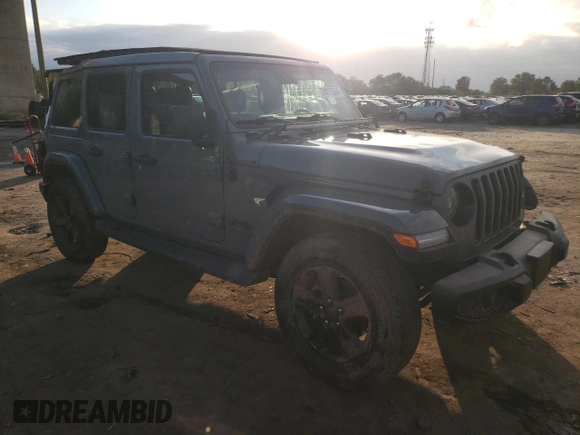 2021 Jeep Wrangler Unlimited Sahara High Altitude with VIN 1C4HJXEG0MW671105, listed as a Copart auction lot 74175244 with 51,610 mi miles and Salvage title. Bid and sale history available at DreamBid. Image 4.