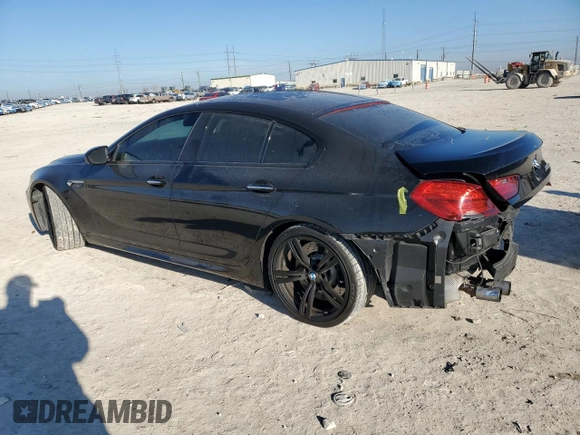 2015 BMW M6 z VIN WBS6C9C5XFD467952, wystawiony jako Copart lot #46312895 z przebiegiem 79 807 mil mil oraz Szkoda całkowita • Salvage title. Historia ofert i sprzedaży dostępna na DreamBid. Obrazek 2.