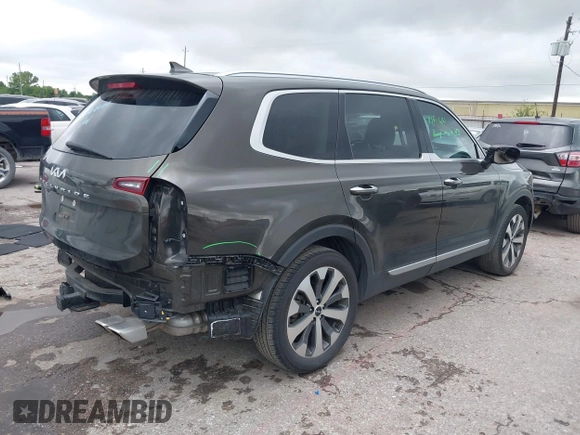 2022 Kia Telluride S with VIN 5XYP64HC3NG256251, listed as a IAAI auction lot 42077499 with 61,402 mi miles and . Bid and sale history available at DreamBid. Image 4.