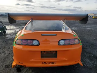 1993 Toyota Supra z VIN JZA800013665, wystawiony jako Copart lot #81811364 z przebiegiem 150 933 mil mil oraz Czysty tytuł • Clean title. Historia ofert i sprzedaży dostępna na DreamBid. Obrazek 6.