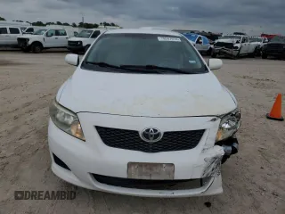 2010 Toyota Corolla with VIN 1NXBU4EE7AZ256666, listed as a Copart auction lot 79097074 with 65,537 mi miles and Salvage title. Bid and sale history available at DreamBid. Image 5.