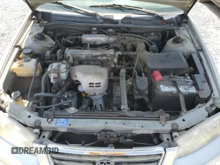 2000 Toyota Camry CE z VIN 4T1BG22K2YU663536, wystawiony jako Copart lot #60101425 z przebiegiem 109 342 mil mil oraz Czysty tytuł • Clean title. Historia ofert i sprzedaży dostępna na DreamBid. Obrazek 11.