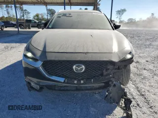 2020 Mazda CX-30 Premium with VIN 3MVDMAEM4LM137806, listed as a Copart auction lot 76620304 with 65,071 mi miles and Salvage title. Bid and sale history available at DreamBid. Image 5.