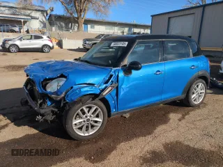 2012 MINI Countryman S with VIN WMWZC3C57CWL80976, listed as a Copart auction lot 50023105 with 74,504 mi miles and Salvage Title. Bid and sale history available at DreamBid. Image 1.