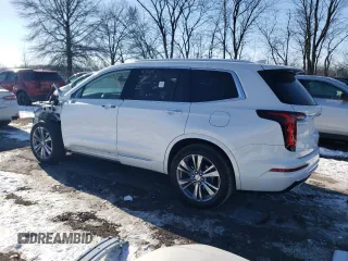 2022 Cadillac XT6 Premium Luxury with VIN 1GYKPCRS0NZ173802, listed as a Copart auction lot 87419534 with 28,373 mi miles and Salvage Title. Bid and sale history available at carsss.com. Image 2.