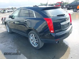 2014 Cadillac SRX Performance Collection с VIN 3GYFNFE38ES656510, выставлен на аукционе IAAI как лот 42336472 с пробегом 125 269 миль миль и . История ставок и продаж доступна на DreamBid. Изображение 3.