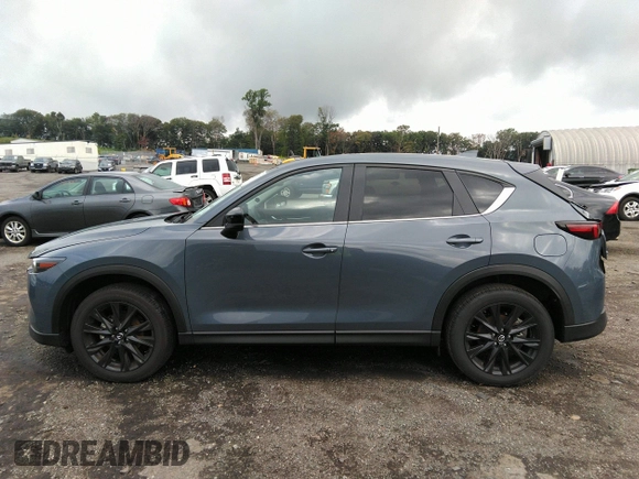 2023 Mazda CX-5 2.5 S Carbon Edition with VIN JM3KFBCM1P0209900, listed as a IAAI auction lot 37342913 with 3,853 mi miles. Bid and sale history available at carsss.com. Image 14.