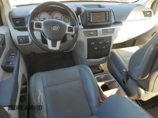 2014 Volkswagen Routan SE with VIN 2C4RVABG9ER135273, listed as a Copart auction lot 45343575 with 94,528 mi miles and Salvage title. Bid and sale history available at DreamBid. Image 8.