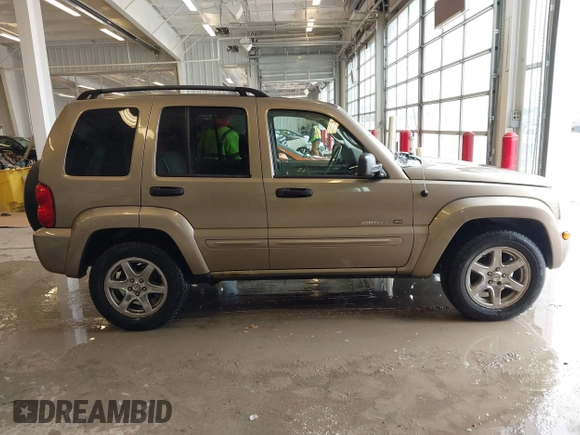 2003 Jeep Liberty Limited with VIN 1J4GK58K63W608970, listed as a IAAI auction lot 41581379 with 220,610 mi miles and . Bid and sale history available at carsss.com. Image 14.