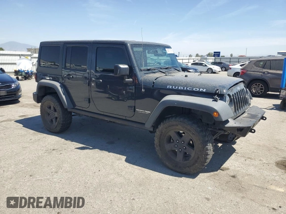 2018 Jeep Wrangler Unlimited Rubicon Recon z VIN 1C4BJWFG6JL857341, wystawiony jako Copart lot #60678185 z przebiegiem 64 115 mil mil oraz Szkoda całkowita • Salvage title. Historia ofert i sprzedaży dostępna na DreamBid. Obrazek 4.