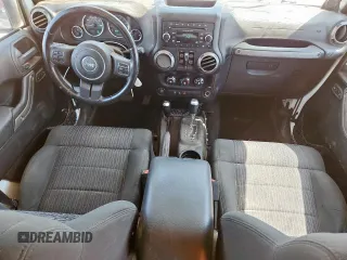2012 Jeep Wrangler Unlimited Sport with VIN 1C4BJWDG9CL187421, listed as a Copart auction lot 61411145 with 140,390 mi miles and Clean title. Bid and sale history available at DreamBid. Image 8.