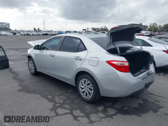 2019 Toyota Corolla L with VIN 5YFBURHE4KP929909, listed as a IAAI auction lot 42078797 with 131,741 mi miles. Bid and sale history available at carsss.com. Image 3.