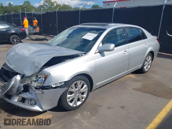 2008 Toyota Avalon XL with VIN 4T1BK36B48U312044, listed as a IAAI auction lot 40394391 with 197,886 mi miles. Bid and sale history available at carsss.com. Image 2.