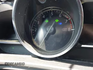 2017 Mazda 3 Grand Touring z VIN 3MZBN1M39HM127811, wystawiony jako IAAI lot #42060315 z przebiegiem Nie podano mil oraz . Historia ofert i sprzedaży dostępna na DreamBid. Obrazek 14.