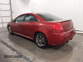 2009 Pontiac G6 GXP 1SA with VIN 1G2ZM577X94157511, listed as a IAAI auction lot 42296880 with 143,960 mi miles and . Bid and sale history available at DreamBid. Image 3.