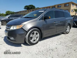 2011 Honda Odyssey Touring с VIN 5FNRL5H97BB501213, выставлен на аукционе Copart как лот 57314115 с пробегом 283 538 миль миль и Списание • Salvage title. История ставок и продаж доступна на DreamBid. Изображение 1.