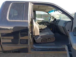 2004 Ford F-150 XLT with VIN 1FTPX14514NB06309, listed as a IAAI auction lot 41202327 with 196,861 mi miles. Bid and sale history available at carsss.com. Image 5.