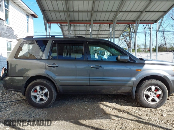 2007 Honda Pilot EX-L with VIN 5FNYF18777B012649, listed as a IAAI auction lot 42070873 with 167,419 mi miles and . Bid and sale history available at DreamBid. Image 13.