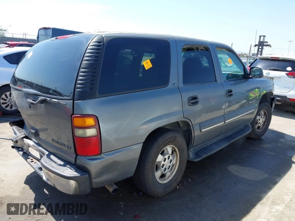 2002 Chevrolet Tahoe LS z VIN 1GNEC13V92R305304, wystawiony jako IAAI lot #41851210 z przebiegiem Nie podano mil oraz . Historia ofert i sprzedaży dostępna na DreamBid. Obrazek 4.