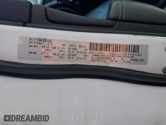 2015 Jeep Grand Cherokee Overland with VIN 1C4RJECG7FC872175, listed as a Copart auction lot 50653205 with 117,433 mi miles and Salvage title. Bid and sale history available at DreamBid. Image 15.
