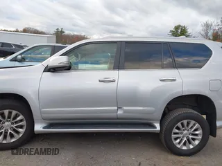 2014 Lexus GX with VIN JTJBM7FX3E5084445, listed as a IAAI auction lot 40640676 with 77,486 mi miles. Bid and sale history available at carsss.com. Image 14.