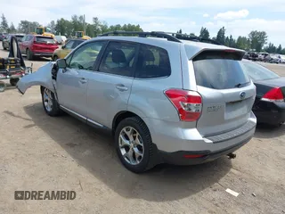 2015 Subaru Forester Touring with VIN JF2SJAWC6FH546472, listed as a IAAI auction lot 42513843 with 107,951 mi miles and . Bid and sale history available at DreamBid. Image 3.
