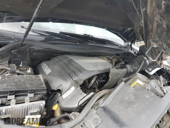 2020 Dodge Durango R/T z VIN 1C4SDHCT3LC393741, wystawiony jako Copart lot #56969185 z przebiegiem Nie podano mil oraz Szkoda całkowita • Salvage title. Historia ofert i sprzedaży dostępna na DreamBid. Obrazek 11.