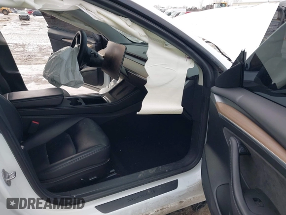 2021 Tesla Model 3 Long Range with VIN 5YJ3E1EB6MF094309, listed as a IAAI auction lot 41651475 with Not Provided miles. Bid and sale history available at carsss.com. Image 5.
