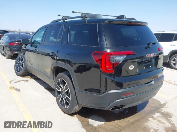2021 GMC Acadia SLT with VIN 1GKKNMLS7MZ204928, listed as a IAAI auction lot 41719245 with 76,825 mi miles. Bid and sale history available at carsss.com. Image 3.