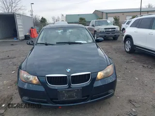 2006 BMW 3 Series 325xi with VIN WBAVD13516KT79513, listed as a IAAI auction lot 41609704 with 116,883 mi miles. Bid and sale history available at carsss.com. Image 12.