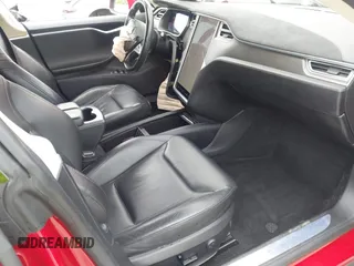 2015 Tesla Model S 85D with VIN 5YJSA1H42FF086599, listed as a IAAI auction lot 41832223 with 67,671 mi miles. Bid and sale history available at carsss.com. Image 5.