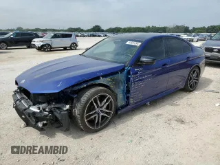 2023 BMW M5 with VIN WBS83CH06PCM62287, listed as a Copart auction lot 54581894 with 0 mi miles and Salvage Title. Bid and sale history available at carsss.com. Image 1.