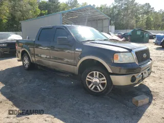 2006 Ford F-150 XLT with VIN 1FTPW12566FA46546, listed as a Copart auction lot 52697455 with 153,515 mi miles and Salvage Title. Bid and sale history available at DreamBid. Image 4.