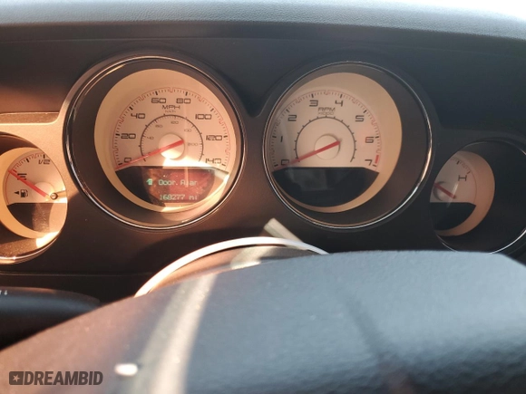 2013 Dodge Challenger SXT with VIN 2C3CDYAGXDH669958, listed as a Copart auction lot 47369965 with 168,277 mi miles and Salvage Title. Bid and sale history available at carsss.com. Image 9.