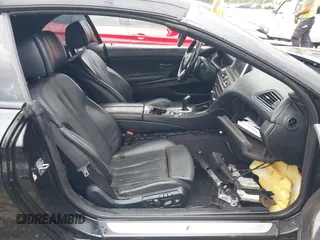 2014 BMW 6 Series 640i z VIN WBALW7C5XED595934, wystawiony jako IAAI lot #42092380 z przebiegiem Nie podano mil oraz . Historia ofert i sprzedaży dostępna na DreamBid. Obrazek 5.