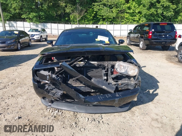 2013 Dodge Challenger SXT z VIN 2C3CDYAG4DH718894, wystawiony jako IAAI lot #42156336 z przebiegiem 153 000 mil mil oraz . Historia ofert i sprzedaży dostępna na DreamBid. Obrazek 6.
