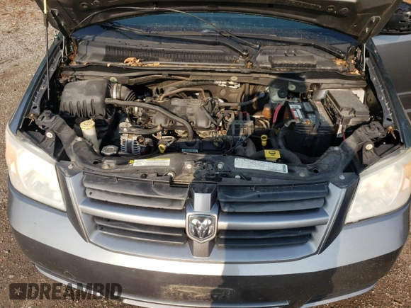 2009 Dodge Grand Caravan SE with VIN 2D8HN44E29R694728, listed as a Copart auction lot 60287565 with 233,018 mi miles and Clean title. Bid and sale history available at DreamBid. Image 12.